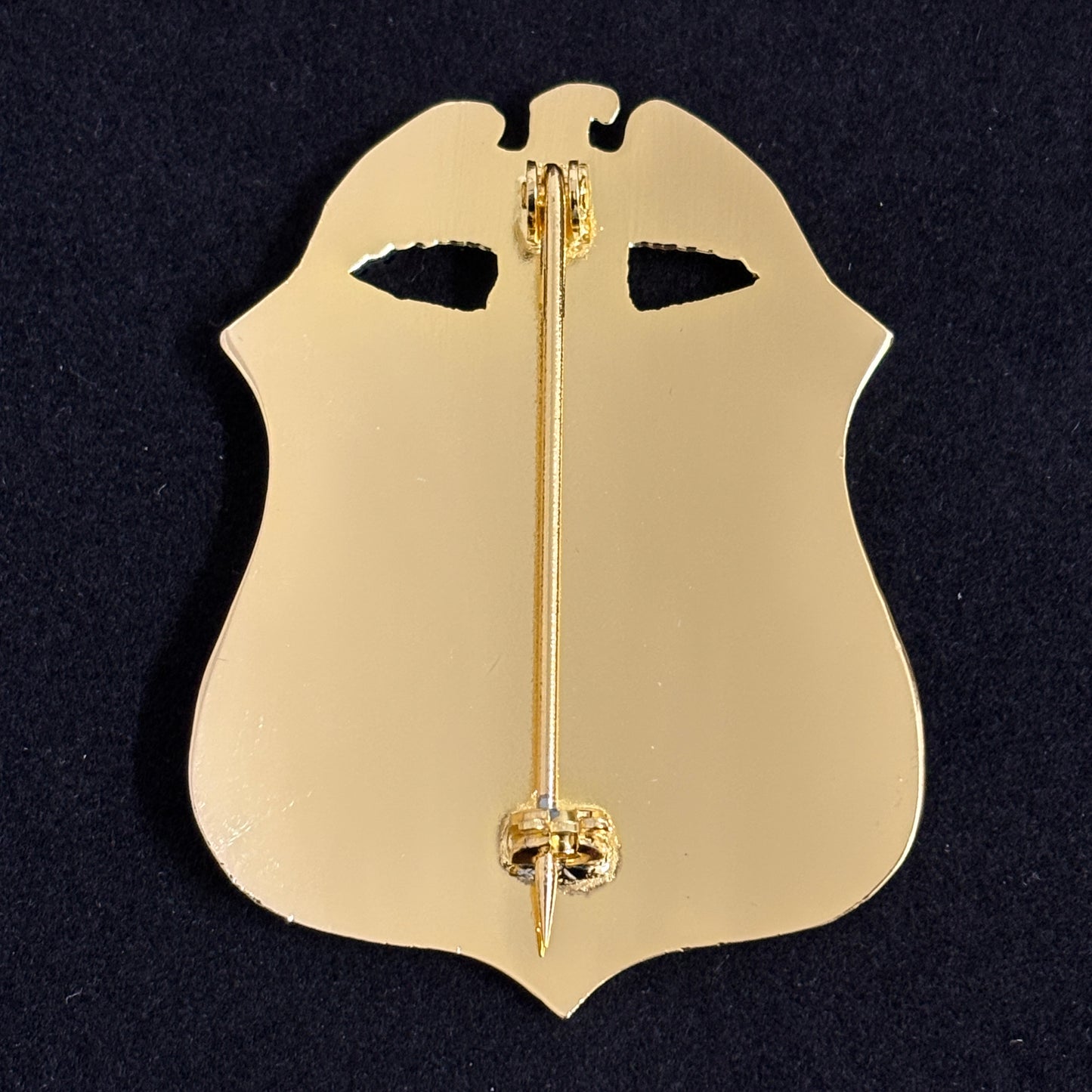 Réplica de la insignia del FBI del Departamento de Justicia, utilería de película