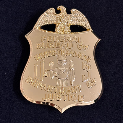 Réplica de la insignia del FBI del Departamento de Justicia, utilería de película